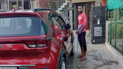 Most of the challans were issued to those washing their vehicles and watering lawns using hosepipes. (HT Photo)