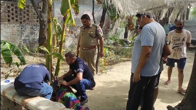 Police investigating the area near Sidhwan Canal in Chhoti Jawaddi where the body was found on Tuesday. (Harvinder Singh/HT)
