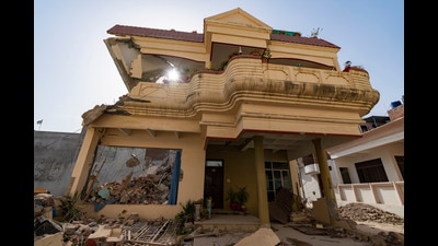 Authorities demolish the residence of activist Javed Mohd which according to them have been constructed illegally in Prayagraj (AP) Authorities demolish the residence of activist Javed Mohd which according to them have been constructed illegally in Prayagraj (AP)