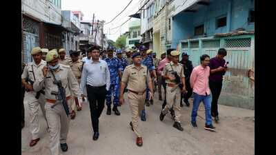 DM Sanjay Khatri and SSP Ajay Kumar taking a round of the affected Atala area on foot on Tuesday. (HT)