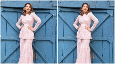 In statement silver danglers and rings from Minerali Store, Sonali aptly accessorised her look for the day. “Feeling pretty in pink,” she captioned the pictures. (Instagram/@iamsonalibendre)