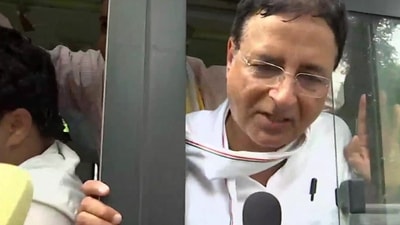 Senior Congress leader Randeep Surjwala being detained by police in Delhi. Senior Congress leader Randeep Surjwala being detained by police in Delhi.
