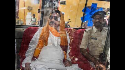 RJD MLA Anant Singh leaves from the court after he was convicted in the AK-47 and hand grenade recovery case, in Patna, on Tuesday. (PTI) RJD MLA Anant Singh leaves from the court after he was convicted in the AK-47 and hand grenade recovery case, in Patna, on Tuesday. (PTI)