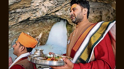 The first prayer (pratham puja), which marks the ceremonial beginning of the annual Amarnath pilgrimage, was held on Tuesday on the occasion of Jyestha Purnima at the holy cave shrine. (PTI) The first prayer (pratham puja), which marks the ceremonial beginning of the annual Amarnath pilgrimage, was held on Tuesday on the occasion of Jyestha Purnima at the holy cave shrine. (PTI)