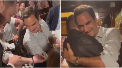 Federer checked out the tattoo before the giving the fan a warm hug (Twitter) Federer checked out the tattoo before the giving the fan a warm hug (Twitter)