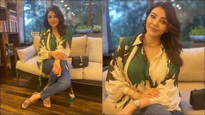 The shirt was tucked inside a pair of straight fit blue denim jeans and leaving her luscious tresses open down her back in side-parted hairstyle, Kajal completed her attire with a pair of strappy black and silver heels. She accessorised her look with a black sling bag, a choker neckpiece, her engagement ring, a stack of bracelets and a wristwatch. &nbsp; (Elevate Promotions/Instagram@kajal_darling)