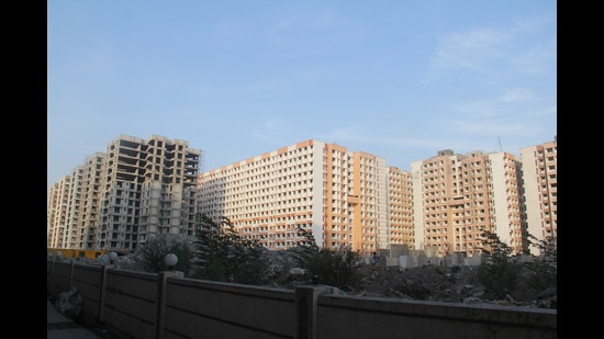 The city’s spread has been flagrant over land reclaimed from swamp and sea, on newer suburbs and since the early 1990s, spiralling upwards in apartment complexes or squashed into apartments constructed for rehabilitating slum residents. (Hindustan Times) The city’s spread has been flagrant over land reclaimed from swamp and sea, on newer suburbs and since the early 1990s, spiralling upwards in apartment complexes or squashed into apartments constructed for rehabilitating slum residents. (Hindustan Times)