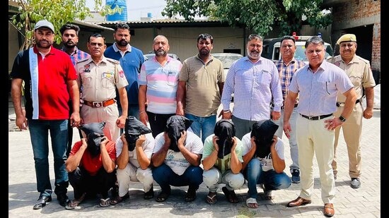 The members of the robbers’ gang in Ludhiana police custody on Tuesday. (HT Photo)