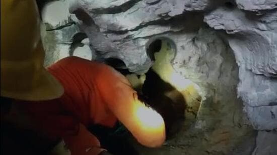 The district administration started digging a 70-feet pit parallel to the borewell on Friday evening and a 15-feet tunnel is also under construction to connect the pit with the borewell so that the child can be rescued. (SCREENGRAB.) The district administration started digging a 70-feet pit parallel to the borewell on Friday evening and a 15-feet tunnel is also under construction to connect the pit with the borewell so that the child can be rescued. (SCREENGRAB.)