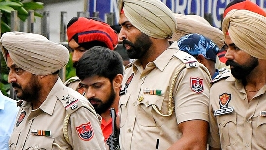 Gangster Lawrence Bishnoi being produced in a Delhi court in connection with the killing of Punjabi singer Sidhu Moose Wala on Tuesday. (ANI)