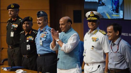 Defence minister Rajnath Singh announced the scheme, which has been at the centre of an intense debate over how it will play out and its implications for national security, at a media briefing in the presence of the three chiefs in New Delhi on Tuesday. (Ajay Aggarwal/HT PHOTO.)