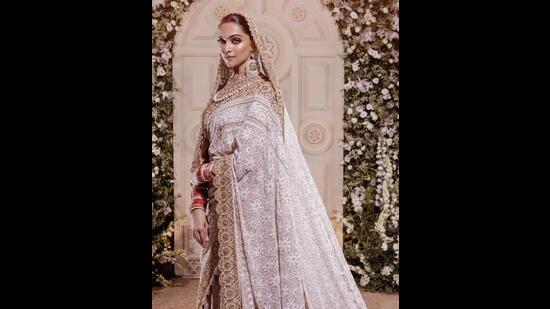 Deepika Padukone opted for a gold and ivory chikankari saree for her wedding reception (Photo: Instagram)