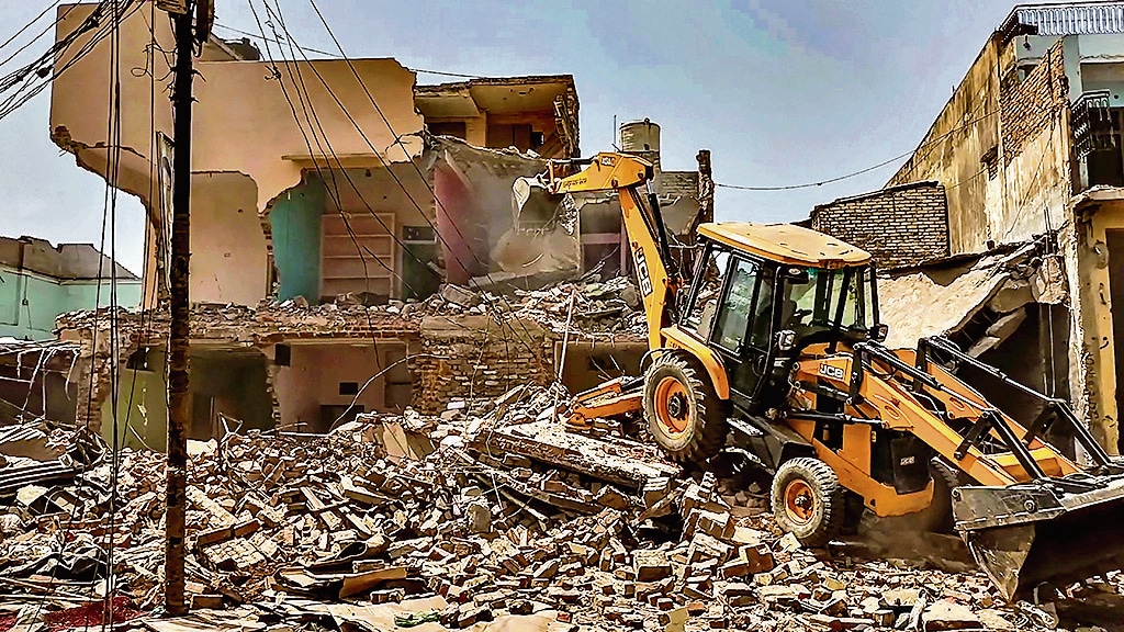 Authorities in Prayagraj, Kanpur and Saharanpur districts have demolished houses of people accused of violence (PTI) Authorities in Prayagraj, Kanpur and Saharanpur districts have demolished houses of people accused of violence (PTI)