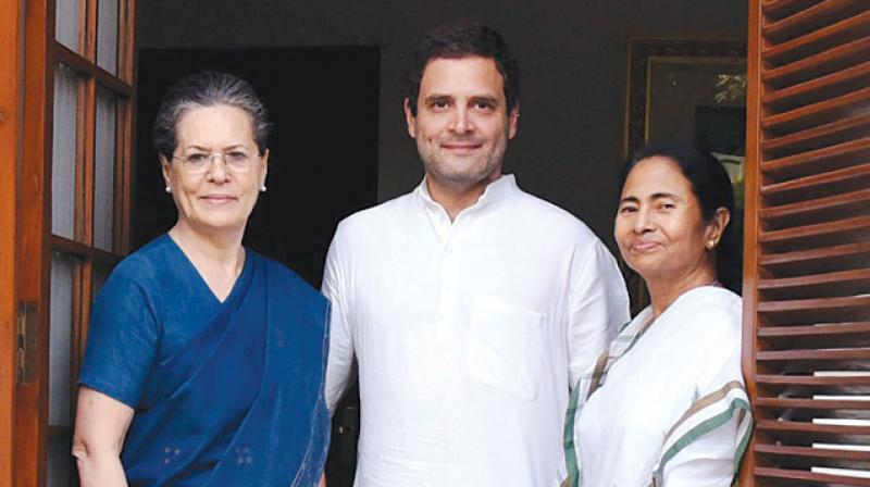 File photo of TMC supremo Mamata Banerjee with Congress leaders Sonia and Rahul Gandhi. (PTI) File photo of TMC supremo Mamata Banerjee with Congress leaders Sonia and Rahul Gandhi. (PTI)