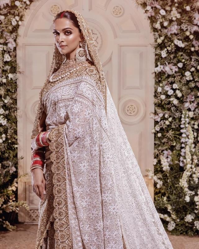 Deepika Padukone opted for a gold and ivory chikankari saree for her wedding reception (Photo: Instagram)