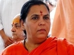 Uma Bharti said she sprinkled some cow dung procured from a desi cow on the auspicious occasion of a full moon on Tuesday.(HT_PRINT) Uma Bharti said she sprinkled some cow dung procured from a desi cow on the auspicious occasion of a full moon on Tuesday.(HT_PRINT)