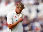 New Zealand's Kyle Jamieson walks off the field after sustaining an injury