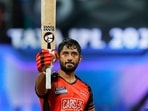 Rahul Tripathi of Sunrisers Hyderabad raises his bat to celebrate his half-century Rahul Tripathi of Sunrisers Hyderabad raises his bat to celebrate his half-century