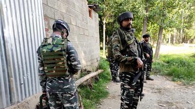 Security personnel at gunbattle scene in Kulgam. (ANI) Security personnel at gunbattle scene in Kulgam. (ANI)