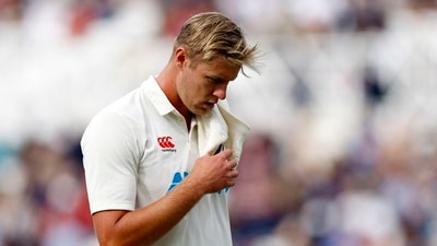 New Zealand's Kyle Jamieson walks off the field after sustaining an injury (Action Images via Reuters)