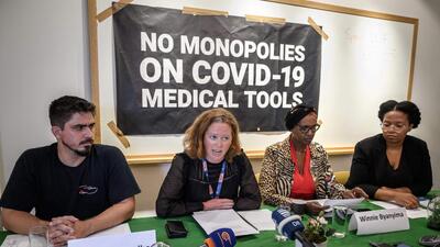 (From L) MSF advocacy advisor Felipe de Carvalho, Oxfam health policy manager Anna Marriott, UNAIDS executive director Winnie Byanyima and Section27 legal researcher Baone Twala attend a press conference urging government to ask for a real TRIPS waivers during the 12th WTO Ministerial Conference in Geneva (AFP)