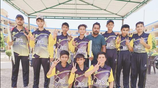 IPS Super Kings team in a jubilant mood after sealing a spot in the final of the ongoing IPS Cricket League being held at International Public School, Sandhu Nagar. Ludhiana. (HT PHOTO)