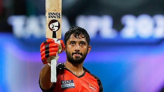 Rahul Tripathi of Sunrisers Hyderabad raises his bat to celebrate his half-century(IPL)