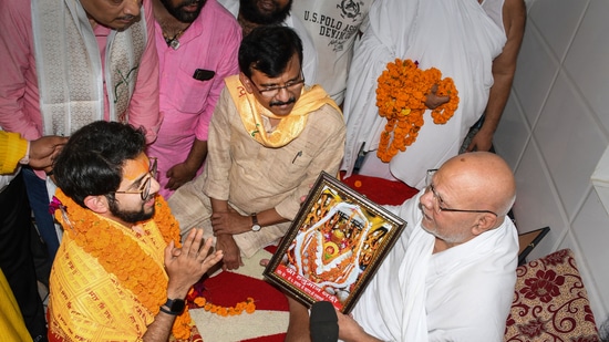 Maharashtra minister Aaditya Thackeray meets Mahant Gyan Das during his visit to Hanuman Garhi Mandir, in Ayodhya, Wednesday, June 15, 2022. Shiv Sena MP Sanjay Raut is also seen. (PTI Photo)