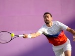 Marin Cilic of Croatia plays a return to Alezander Bublik of Kazakhstan during their singles tennis match at the Queen's Club Championships in London(AP) Marin Cilic of Croatia plays a return to Alezander Bublik of Kazakhstan during their singles tennis match at the Queen's Club Championships in London(AP)