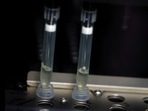 FILE PHOTO: Two samples of suspected cases of monkeypox go through a process of nucleic acid extraction as they get tested at a microbiology lab at La Paz Hospital in Madrid, Spain,