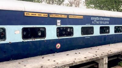 Agnipath protests: Damaged windows of an empty train coach pictured after protestors pelted stones during a protest over Agnipath scheme in Gwalior on Thursday (ANI) Agnipath protests: Damaged windows of an empty train coach pictured after protestors pelted stones during a protest over Agnipath scheme in Gwalior on Thursday (ANI)