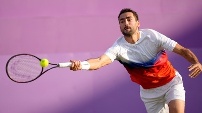 Marin Cilic of Croatia plays a return to Alezander Bublik of Kazakhstan during their singles tennis match at the Queen's Club Championships in London (AP) Marin Cilic of Croatia plays a return to Alezander Bublik of Kazakhstan during their singles tennis match at the Queen's Club Championships in London (AP)