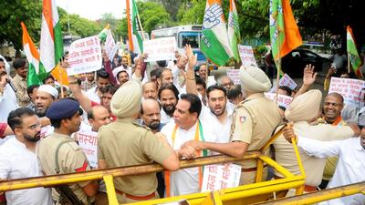 Congress workers protesting against the summoning of Rahul Gandhi by the ED, at Sector 35 in Chandigarh on Thursday. (Ravi Kumar/HT)