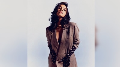 Malavika Mohanan styled it with a pair of black printed gloves that went up till her elbows. (Instagram/@malavikamohanan_) Malavika Mohanan styled it with a pair of black printed gloves that went up till her elbows. (Instagram/@malavikamohanan_)