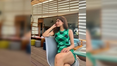 Khushi Kapoor shared a series of photos of herself donning a short green and black bodycon checkered ribbed-knit dress and added green nature-related emojis to the caption. (Instagram/@khushi05k) Khushi Kapoor shared a series of photos of herself donning a short green and black bodycon checkered ribbed-knit dress and added green nature-related emojis to the caption. (Instagram/@khushi05k)