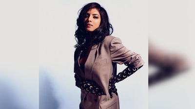 Malavika Mohanan ditched designer wears and picked this vintage suit from her grandpa's collection for her latest photoshoot. (Instagram/@malavikamohanan_) Malavika Mohanan ditched designer wears and picked this vintage suit from her grandpa's collection for her latest photoshoot. (Instagram/@malavikamohanan_)