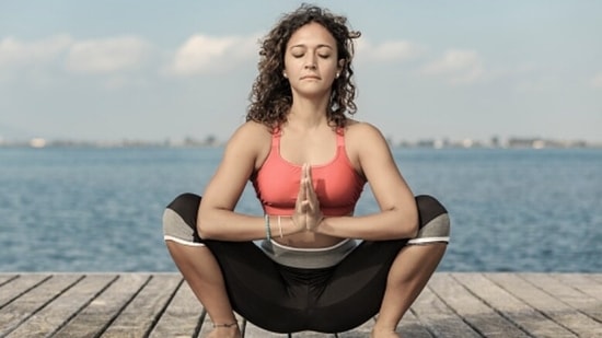 Expert shares yoga asanas to perform while binge watching your favourite series (Unsplash)