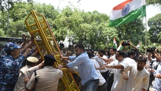 Congress workers stage a protest outside the AICC office against the summoning of party leader Rahul Gandhi by the Enforcement Directorate in connection with the National Herald case, in New Delhi on Wednesday. (Arvind Yadav/ Hindustan Times)(HT_PRINT)