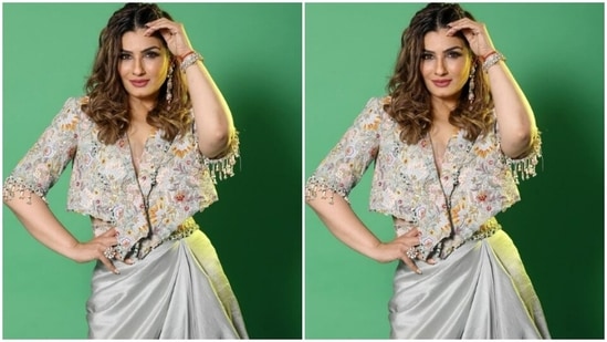 Raveena wore her tresses open in soft wavy curls as she posed for the cameras.(Instagram/@officialraveenatandon)