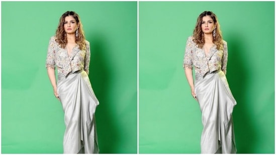 Raveena opted for a minimal makeup look to complement her attire. In smokey eyeshadow, black eyeliner, black kohl, mascara-laden eyelashes, drawn eyebrows, contoured cheeks and a shade of soft red lipstick, she looked fashion-ready.(Instagram/@officialraveenatandon)