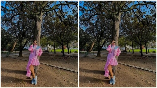 Rubina decked up in a pink dress with turtleneck and frills and teamed it with a super cool pink bomber cropped jacket with blue denim details at the neck.(Instagram/@rubinadilaik)