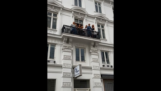 The image, taken from the viral Instagram video that former president Barack Obama posted, shows the singers in a balcony. (Instagram/@barackobama)
