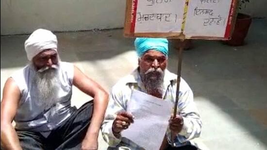The 55-year-old man took off his shirt and raised slogans against the police department in Ludhiana on Wednesday. (Harvinder Singh//HT)