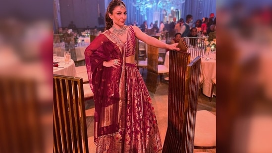 Soha Ali Khan earlier graced a wedding ceremony donning a deep purple lavender lehenga paired with statement jewellery.(Instagram/@sakpataudi)