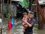SDRF members carry out rescue work in a flood-hit locality in Bongaigaon town of Assam. (PTI) SDRF members carry out rescue work in a flood-hit locality in Bongaigaon town of Assam. (PTI)
