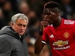 Jose Mourinho with Paul Pogba Jose Mourinho with Paul Pogba
