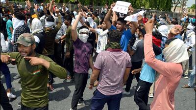 Protestors during a demonstration against the Agnipath Recruitment Scheme for the defence sector on Friday. (ANI PHOTO.)
