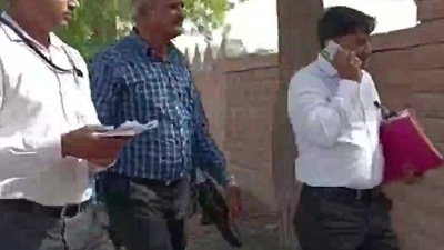 CBI officials at the residence of Agrasen Gehlot. (ANI) CBI officials at the residence of Agrasen Gehlot. (ANI) 