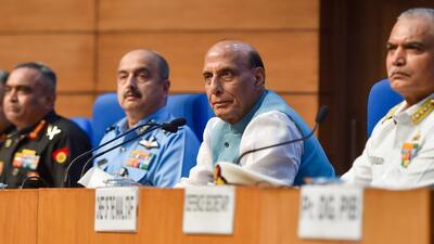 Union Defence Minister Rajnath Singh with the three service chiefs General Manoj Pande, Air Chief Marshal VR Chaudhari and Admiral R Hari Kumar at the launch of Agnipath, the defence recruitment scheme, in New Delhi. (PTI PHOTO.)