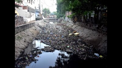 A choked drain in old city area of Prayagraj. (HT Photo) A choked drain in old city area of Prayagraj. (HT Photo)